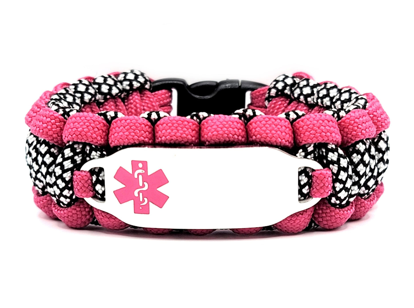 Pink, black, and silver paracord medical alert bracelet with a silver colored, stainless steel ID tag with an enameled pink medical symbol, displayed on a white background.