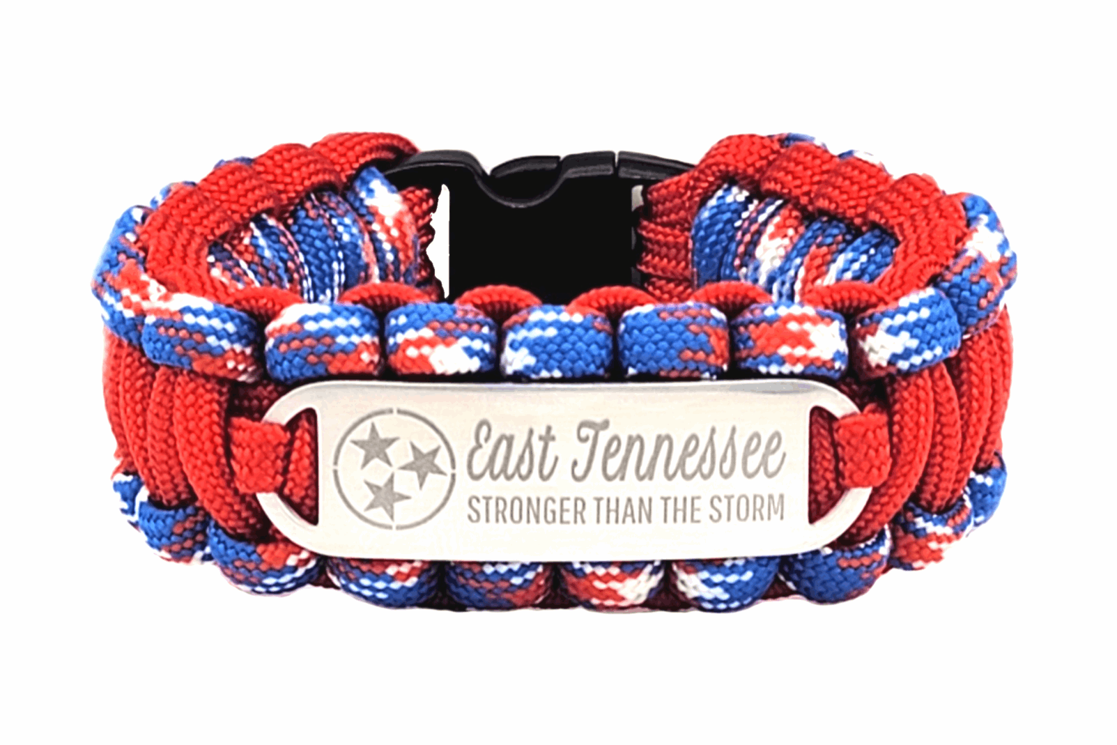 A red, white, and blue paracord ID bracelet with a silver, stainless steel ID tag engraved with East Tennessee Stronger than the Storm and a Tennessee flag symbol, displayed on a white background.