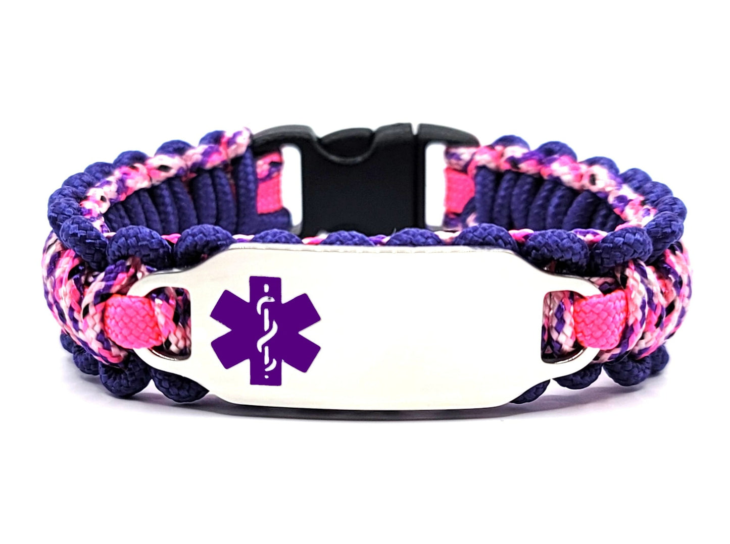 Pink & Purple, thin, 275 paracord medical alert bracelet with a silver colored, stainless steel ID tag with an enameled purple medical symbol, displayed on a white background.